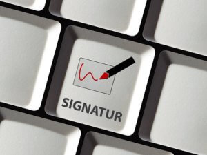 Digitale Signatur auf Tastatur